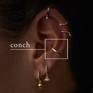 conch piercing - arya tattoo and piercing